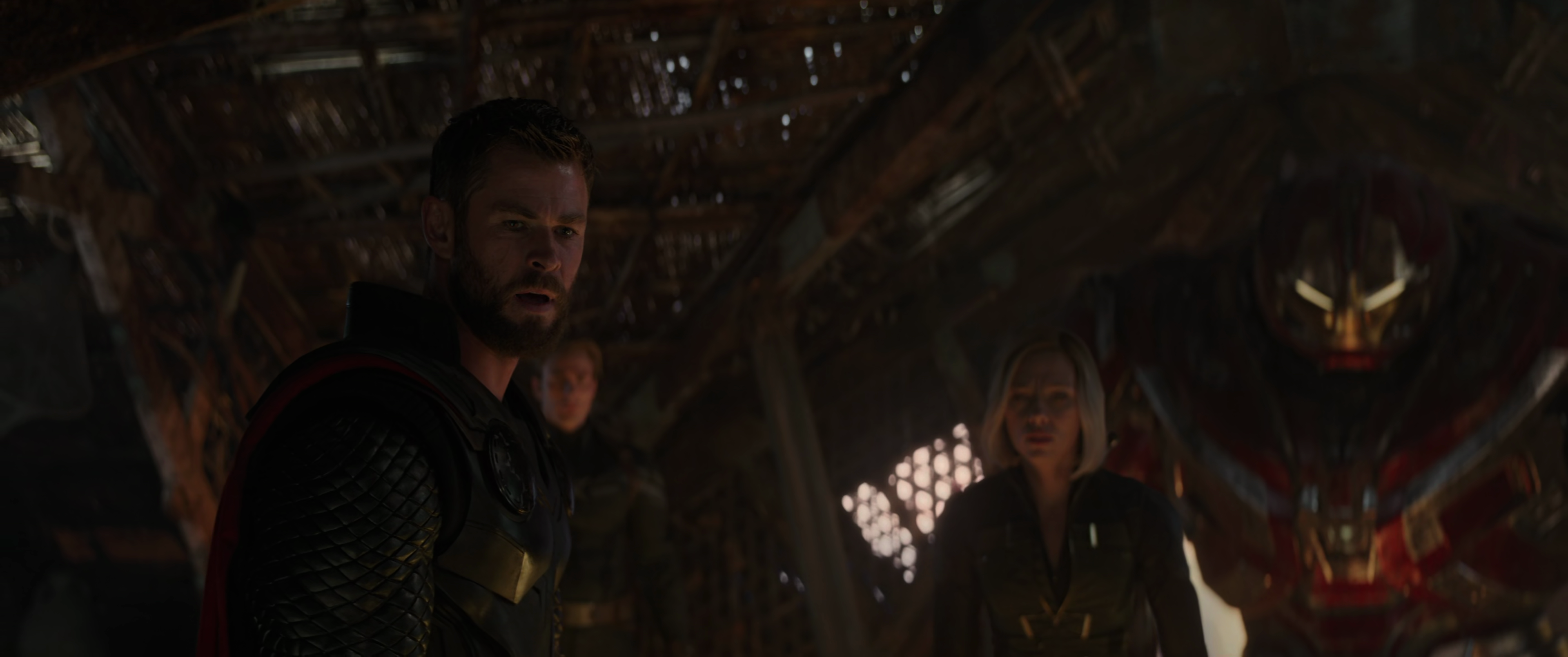 Thor (Chris Hemsworth) finally goes for the head as War Machine (Don Cheadle), Black Widow (Scarlett Johansson), and a Hulk-buster clad Bruce Banner (Mark Ruffallo) look on in Avengers: Endgame (2019), Marvel Entertainment via Blu-ray