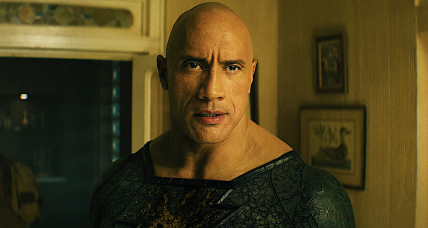 Black Adam (Dwayne Johnson) and Hawkman (Aldis Hodge) are about to settle their differences in Black Adam (2022), Warner Bros. Pictures