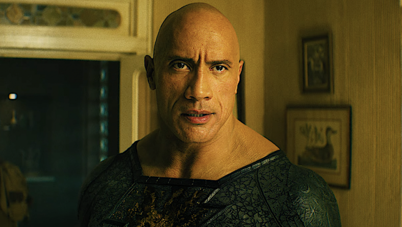 Black Adam (Dwayne Johnson) and Hawkman (Aldis Hodge) are about to settle their differences in Black Adam (2022), Warner Bros. Pictures