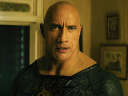 Black Adam (Dwayne Johnson) and Hawkman (Aldis Hodge) are about to settle their differences in Black Adam (2022), Warner Bros. Pictures