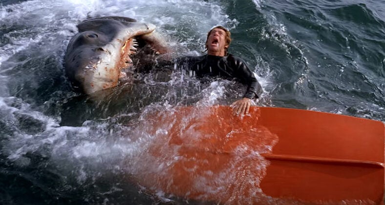 A great white shark kills a swimmer in 'Jaws,' (1975), Universal Pictures