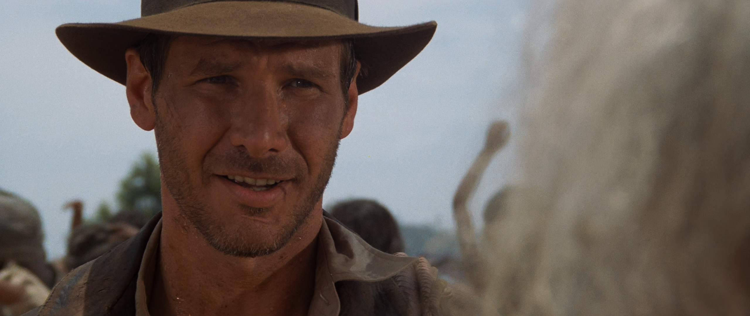 Indiana Jones (Harrison Ford) returns the Shiva lingam stone to Mayapore's shaman (D. R. Nanayakkara) in Indiana Jones and the Temple of Doom (1984), Lucasfilm Ltd. via Blu-ray