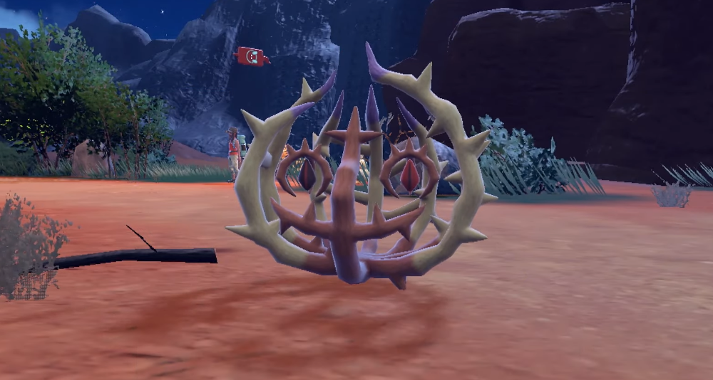Brambleghast sits in the desert at night via Pokémon Scarlet & Violet (2022), Nintendo