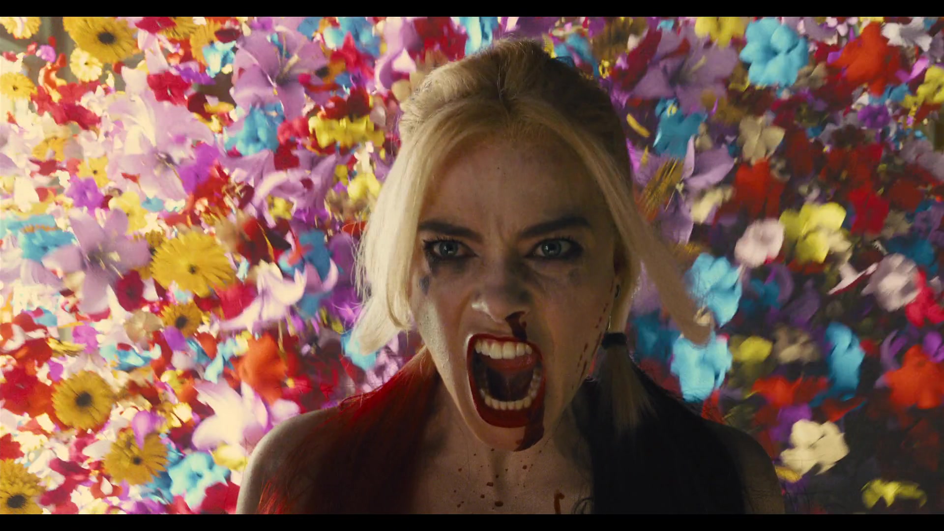 Harley Quinn (Margot Robbie) makes her escape in The Suicide Squad (2021), Warner Bros. Pictures via Blu-ray