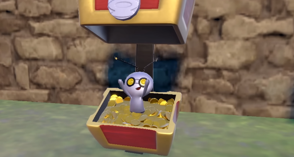 A Chest form Gimmighoul jumps out to surprise would-be looters via Pokémon Scarlet & Violet (2022), Nintendo