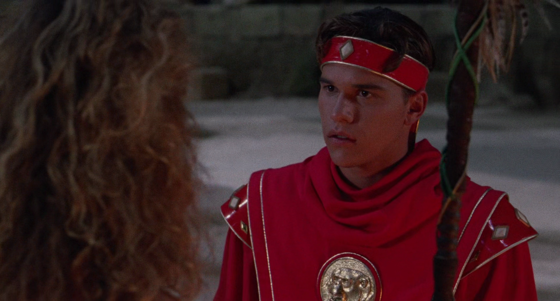 Rocky DeSantos (Steve Cardenas) learns of his connection to the Ape Ninjetti from Dulcea (Gabrielle Fitzpatrick) in Mighty Morphin Power Rangers: The Movie (1995), Saban Entertainment via Blu-ray