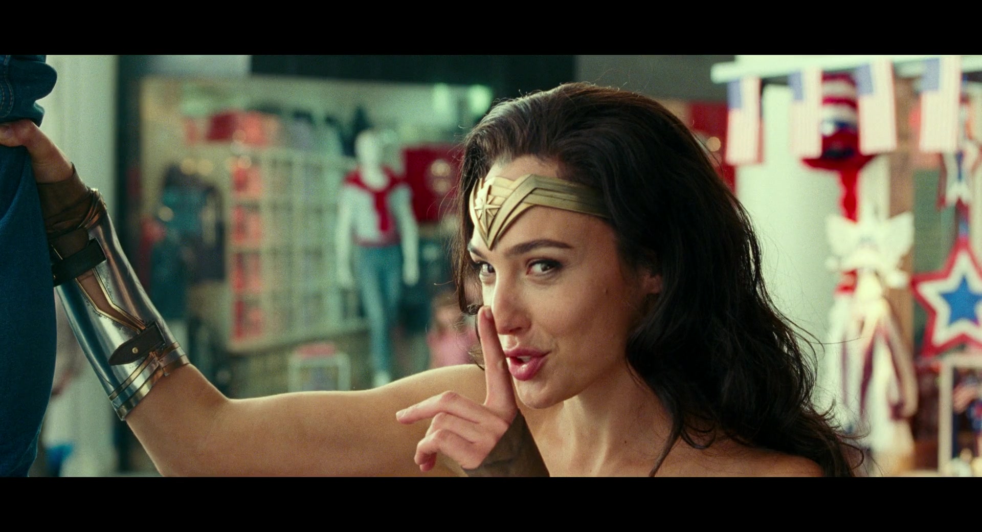 Wonder Woman (Gal Gadot) entrusts a young fan with her secret in Wonder Woman (Gal Gadot) finally learns to fly in Wonder Woman 1984 (2020), Warner Bros. Pictures via Blu-ray