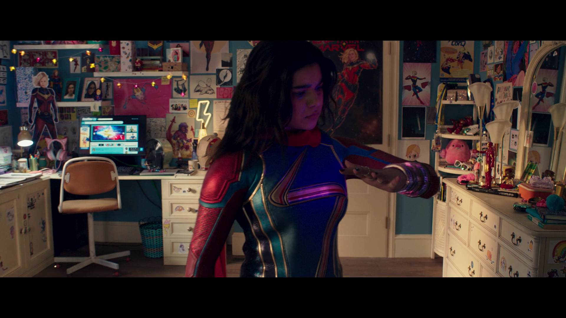 Kamala Khan (Iman notices her bangle acting up in the post-credits scene to Ms. Marvel Season 1 Episode 6 “No Normal” (2022), Marvel Entertainment via Disney Plus