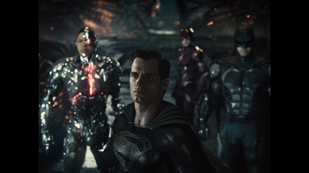 Superman (Henry Cavill), Cyborg (Ray Fisher), Batman (Ben Affleck) and The Flash (Ezra Miller) let Apokolips know that Earth has defenders in Zack Snyder's Justice League (2021), Warner Bros. Pictures via Blu-ray