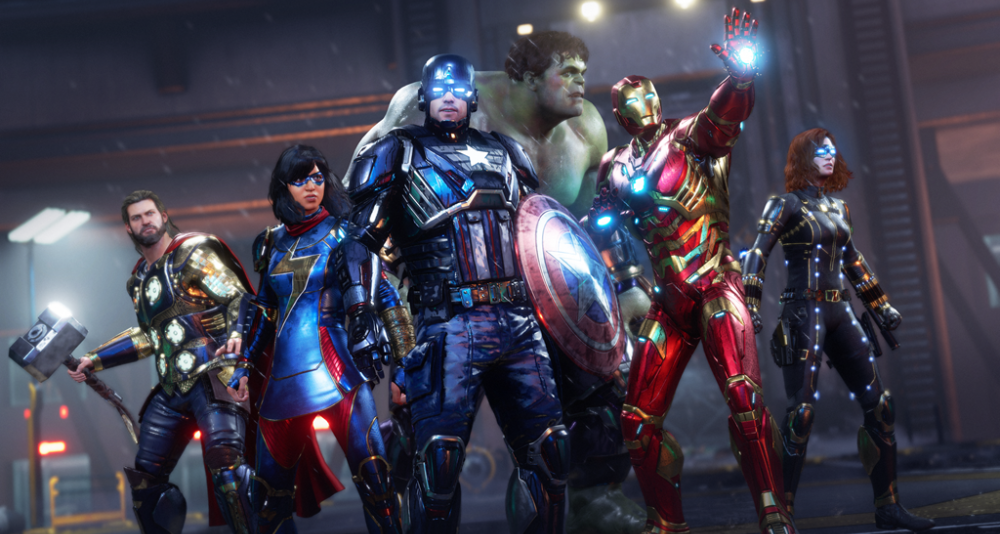 Thor (Travis Willingham), Kamala Khan (Sandra Saad), Capitão América (Jeff Schine), Hulk (Darin De Paul), Homem de Ferro (Nolan North) e Viúva Negra (Laura Bailey) estão prontos para lutar em Vingadores da Marvel (2020) ), Square Enix