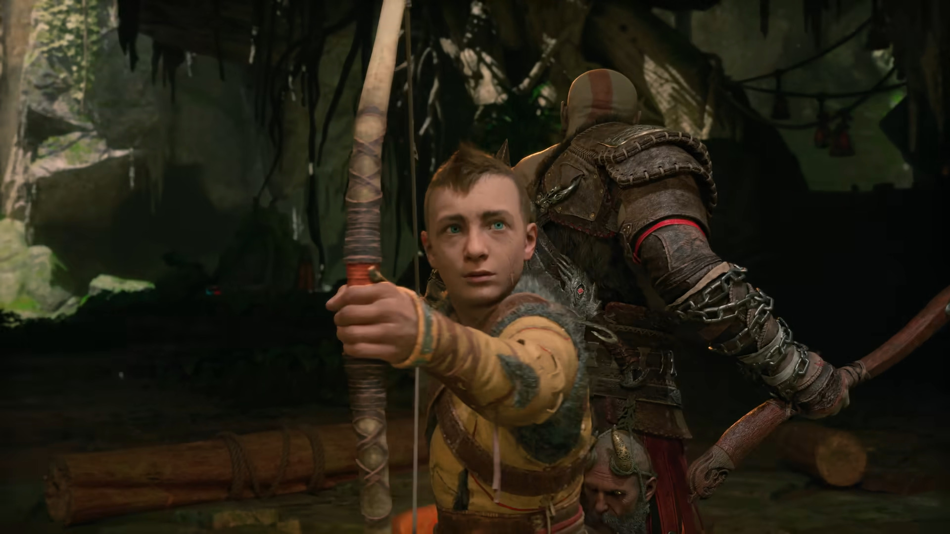 Atreus (Sunny Suljic) and Kratos (Christopher Judge) brace themselves for an attack in God of War: Ragnarök (2022), Sony Santa Monica Studios via YouTube