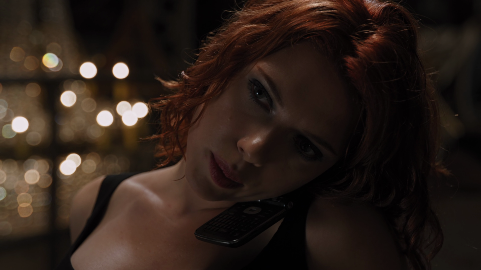 Black Widow (Scarlett Johansson) answers a call in The Avengers (2012), Marvel Entertainment via Blu-ray