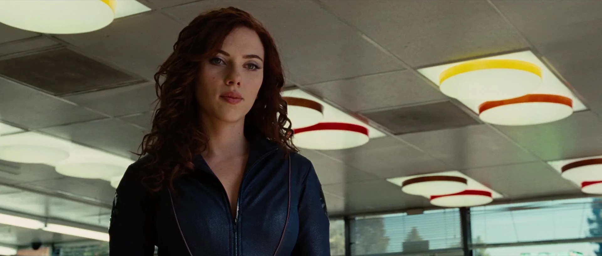 Black Widow (Scarlett Johansson) reveals her identity as an Agent of S.H.I.E.L.D. in Iron Man 2 (2010), Marvel Entertainment via Blu-ray