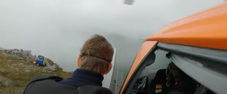 WATCH: Tom Cruise Performs Wild Motorcycle Jump Off A Norwegian Cliff