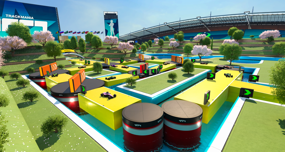 Players drive around an obstacle course surrounded by trees, astroturf, water, and a stadium via Trackmania (2020), Ubisoft