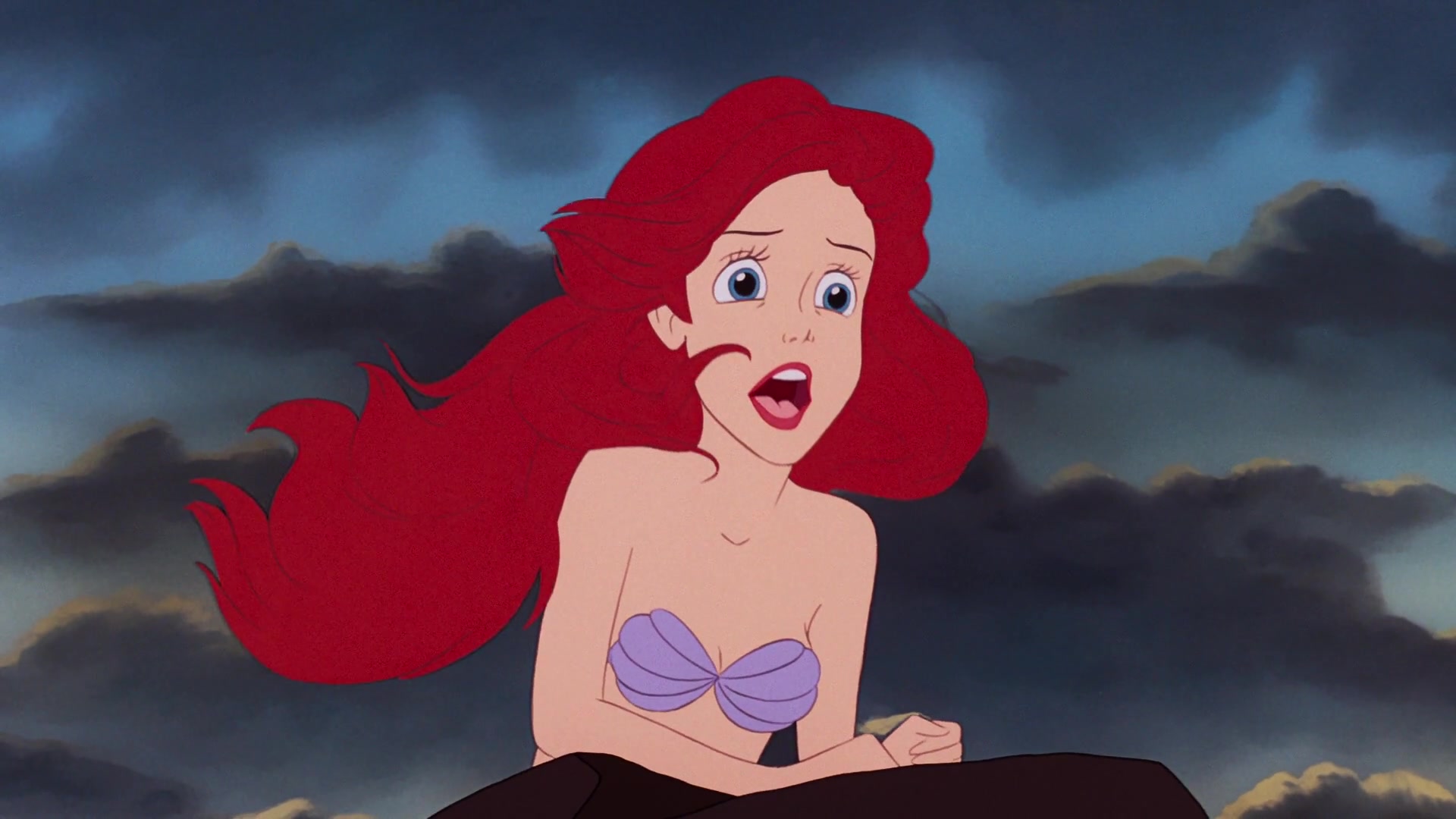 Ariel (Jodi Benson) longs for the surface world in The Little Mermaid (1989), Disney