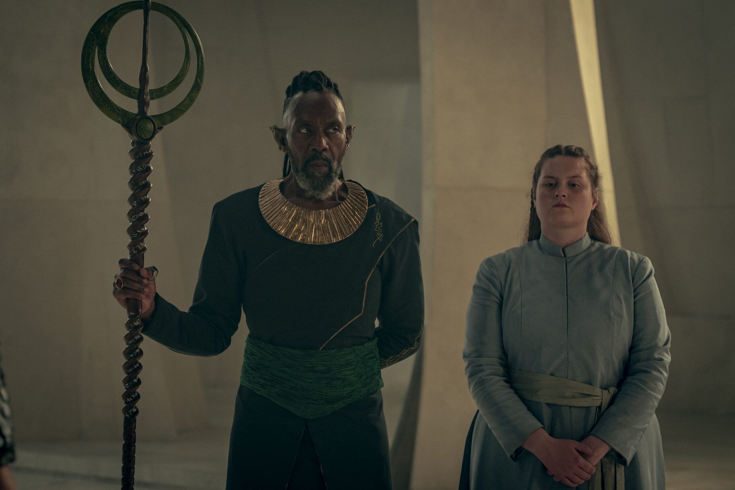 Lenny Henry as Chief David Balor, Amy Murray as Fenrik in The Witcher: Blood Origin (2022) via Netflix
