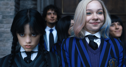 Wednesday. (L to R) Jenna Ortega as Wednesday Addams, Emma Myers as Enid Sinclair in episode 102 of Wednesday. Cr. Courtesy of Netflix © 2022
