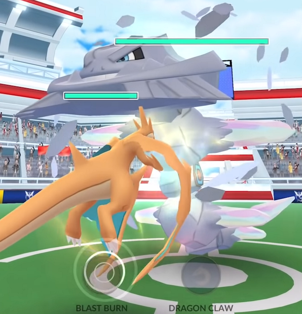 A Mega Charizard Y faces off against a Mega Steelix in a Mega Raid via Pokémon GO (2016), Niantic