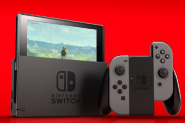 A Nintendo Switch with grey Joy-Cons on a red background. The Legend of Zelda: Breath of the Wild can be seen on the screen via Nintendo