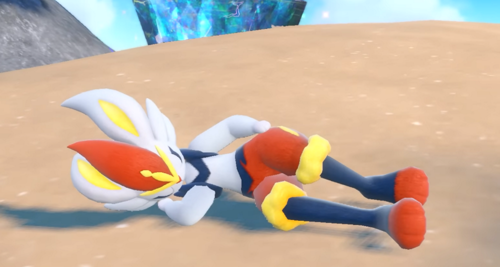 A Cinderace naps in front of a Black Tera Crystal via Pokémon Scarlet & Violet (2022), Nintendo