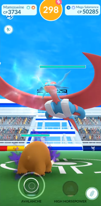 A Mamoswine faces off against a giant Mega Salamence in a Raid Battle via Pokémon GO (2016), Niantic