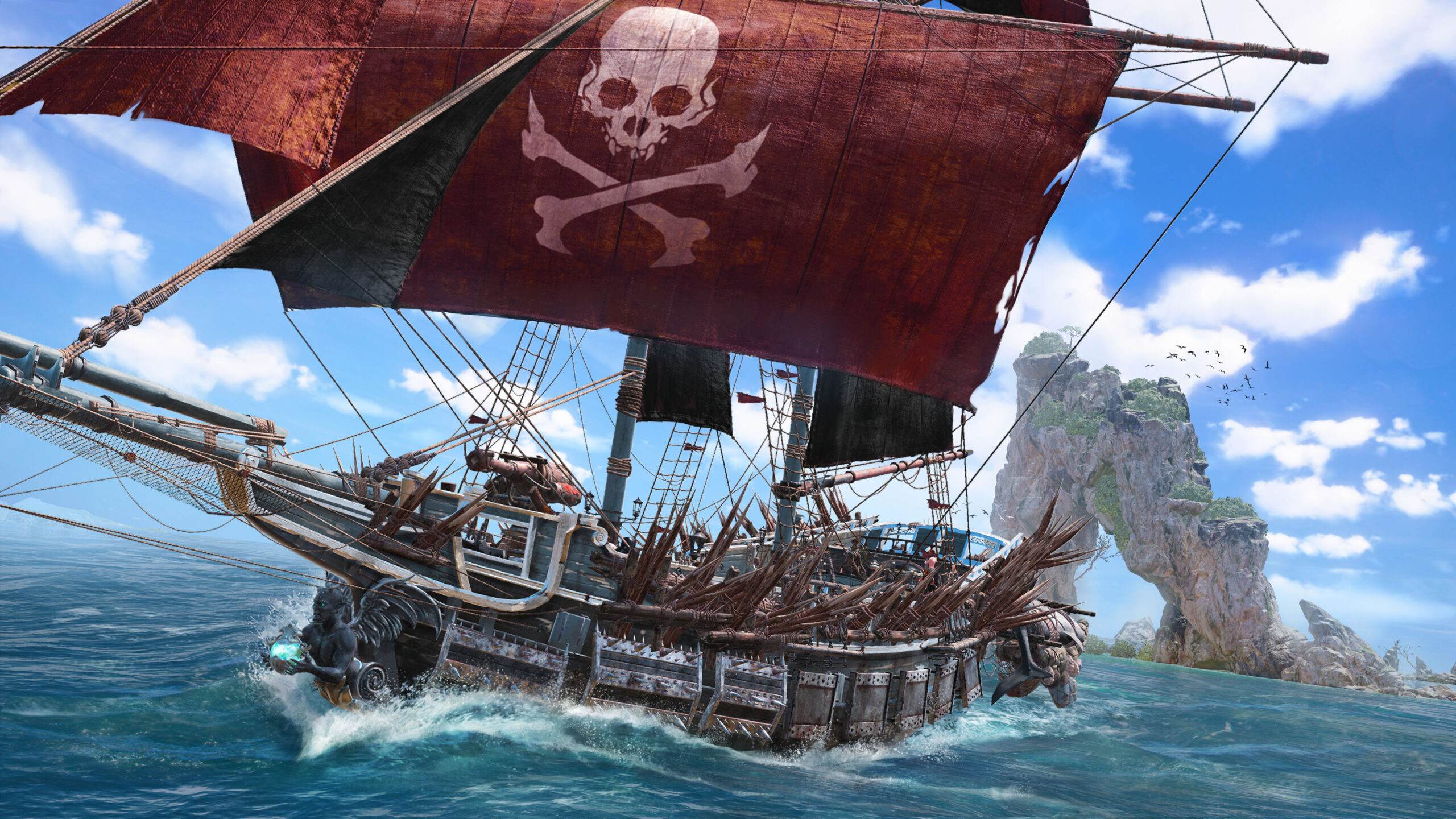 A pirate ship with crimson sails cuts through the waves via Skull and Bones (2023), Ubisoft