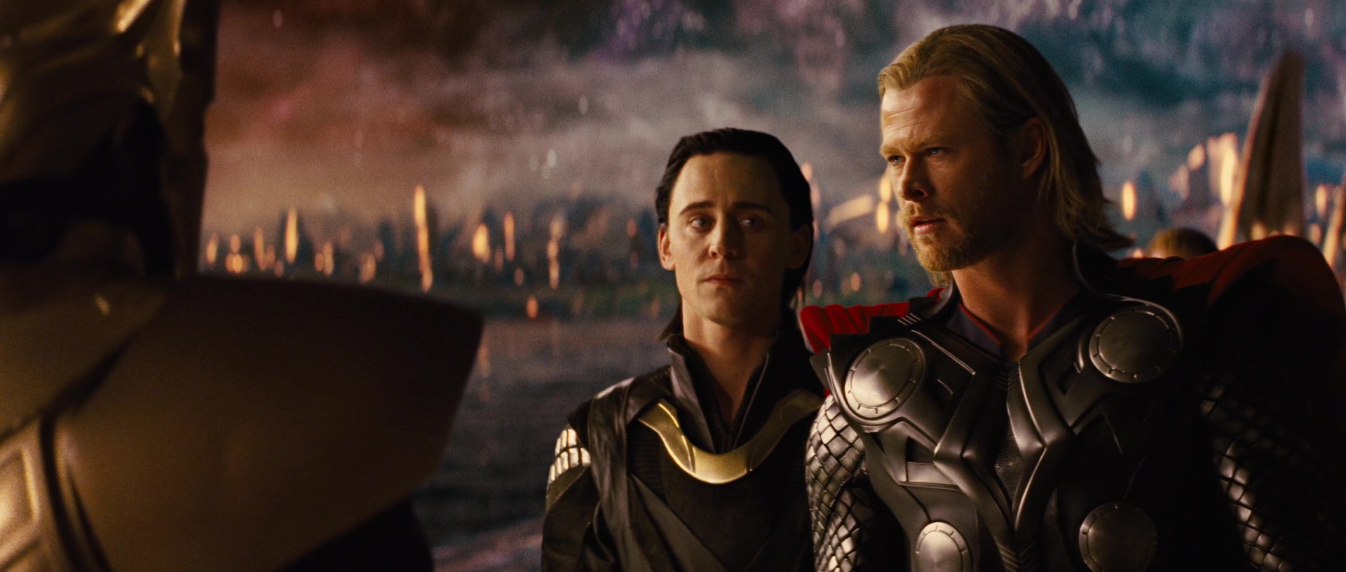 Thor (Chris Hemsworth) and Loki (Tom Hiddleston) ask Heimdall (Idris Elba) to unlock the Bifrost in Thor (2011), Marvel Entertainment
