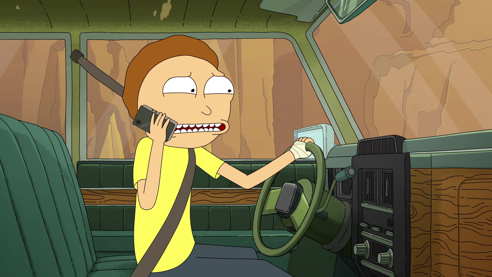 Morty (Justin Roiland) calls Rick (Justin Roiland) for help in Rick and Morty Season 5 Episode 9 "Forgetting Sarick Mortshall" (2021), Adult Swim