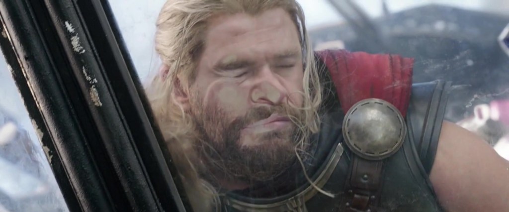 Thor (Chris Hemsworth) is splattered against the windshield of Valkyrie's (Tessa Thomspon) ship in Thor: Ragnarok (2017), Marvel Entertainment