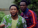Kevin (Jacob Latimore) and Damon (Tosin Cole) are surprised by a visitor in House Party (2023), Warner Bros. Pictures