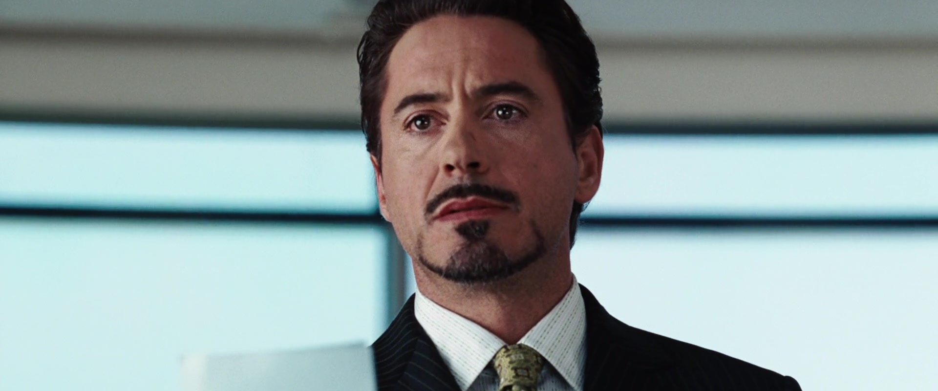 Tony Stark (Robert Downey Jr.) makes a decision about his secret identity in Iron Man (2008), Marvel Entertainment