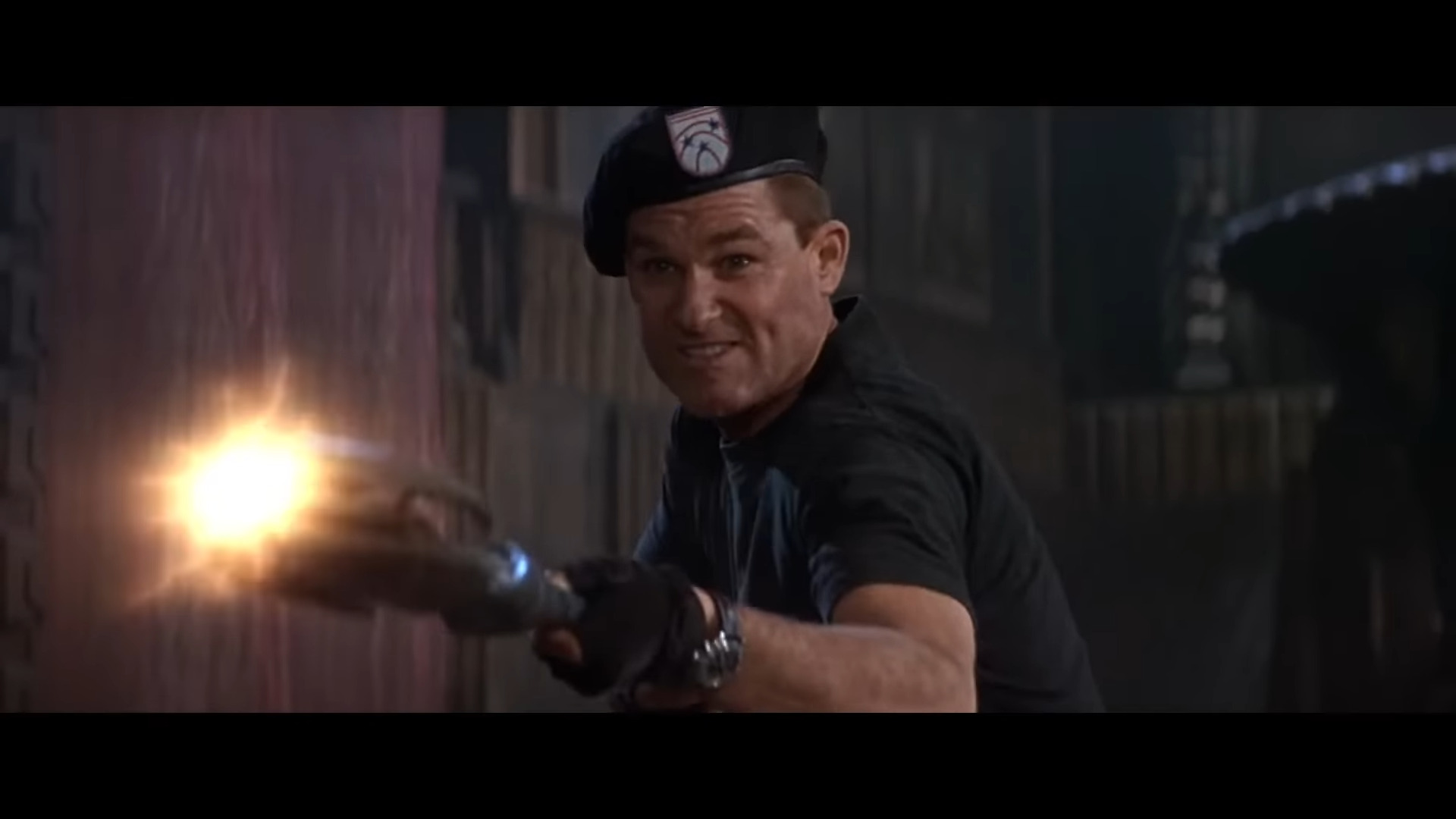 Col. Jack O'Neil (Kurt Russell) fires a Ma'Tok staff in Stargate (1994), MGM
