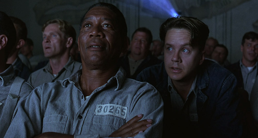 Andy and Red watching a movie in 'The Shawshank Redemption' (1994), Columbia Pictures