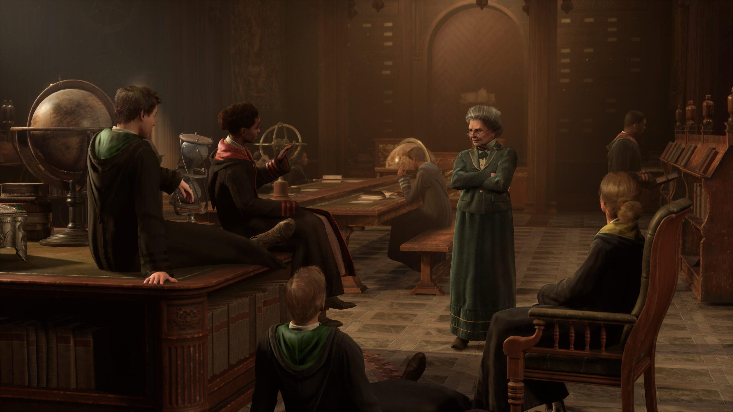 Professor Matilda Weasley speaks to Sebastian Sallow, Natasi Onai, and other students via Hogwarts Legacy (2023), Warner Bros. Interactive Entertainment