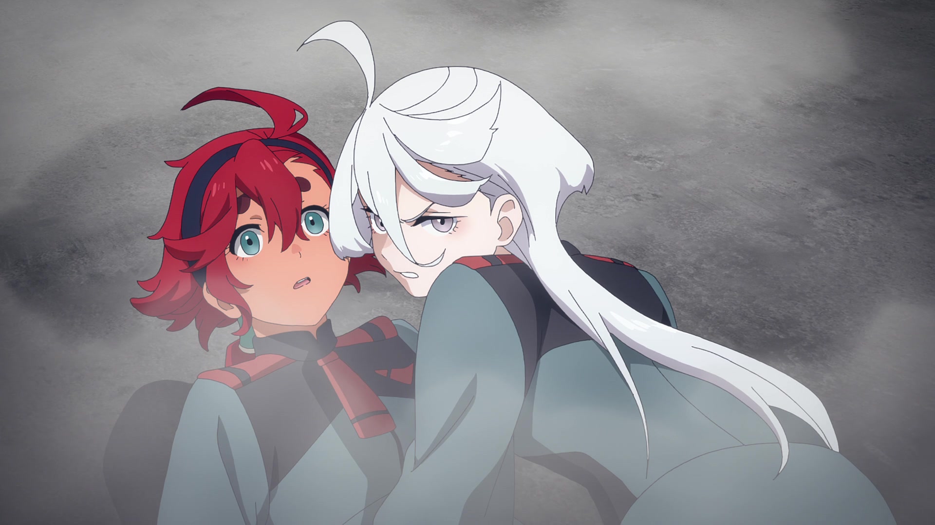 Miorine (Lynn) throws herself on top of Suletta (Kana Ichinose) to protect her in Mobile Suit Gundam: The Witch from Mercury Episode 2 "Cursed Mobile Suit" (2022), Bandai Namco Filmworks