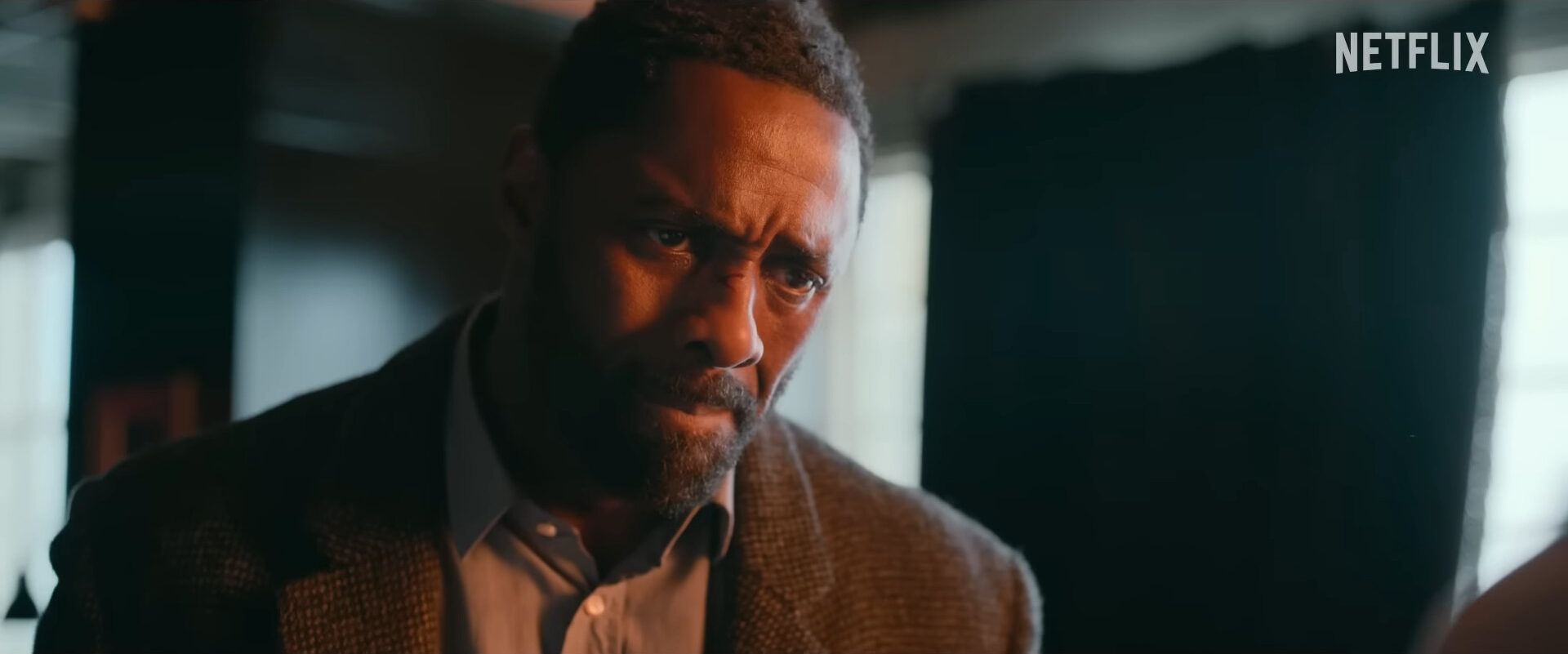 John Luther (Idris Elba) hunts down serial killer David Robey (Andy Serkis) in Luther: The Fallen Sun (2023), Netflix