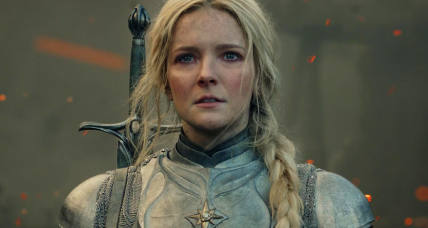 Galadriel (Morfydd Clark) stands alone in the immediate aftermath of the eruption of Mt. Doom in The Lord of the Rings: The Rings of Power Season 1 Episode 6 "Udûn" (2022), Amazon Studios