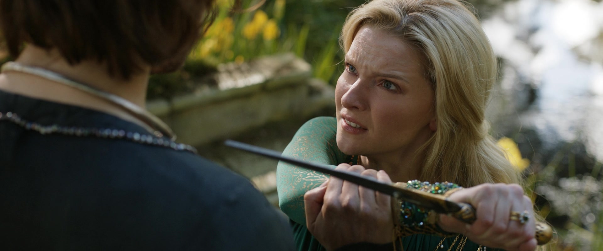Halbrand (Charlie Vickers) stays Galadriel's (Morfydd Clark) hand after she learns his true identity in The Lord of the Rings: The Rings of Power Season 1 Episode 8 "Alloyed" (2022), Amazon Studios