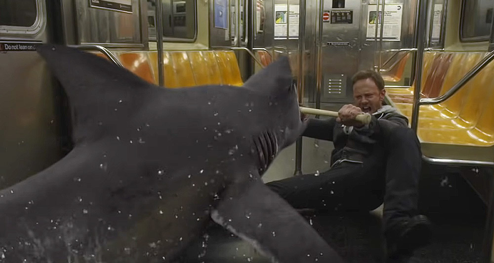 A shark attacks a man on a subway train in 'Sharknado 2' (2014), SyFy Films
