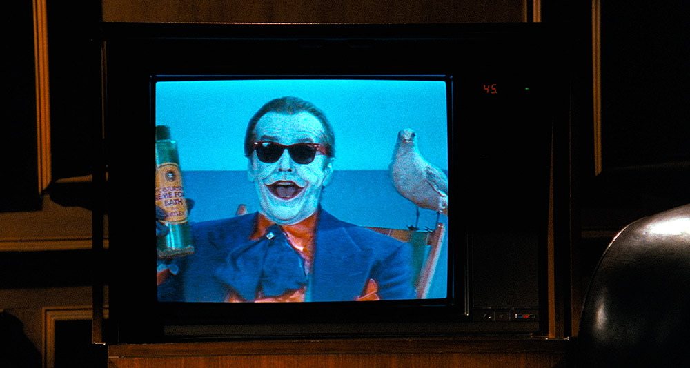 The Joker cuts a terrifying television commercial in 'Batman' (1989), Warner Bros. Pictures
