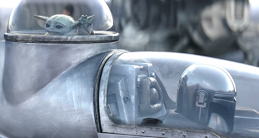Grogu and Din Djarin in his customized Naboo Starfighter in 'The Mandalorian' (2023), Disney+