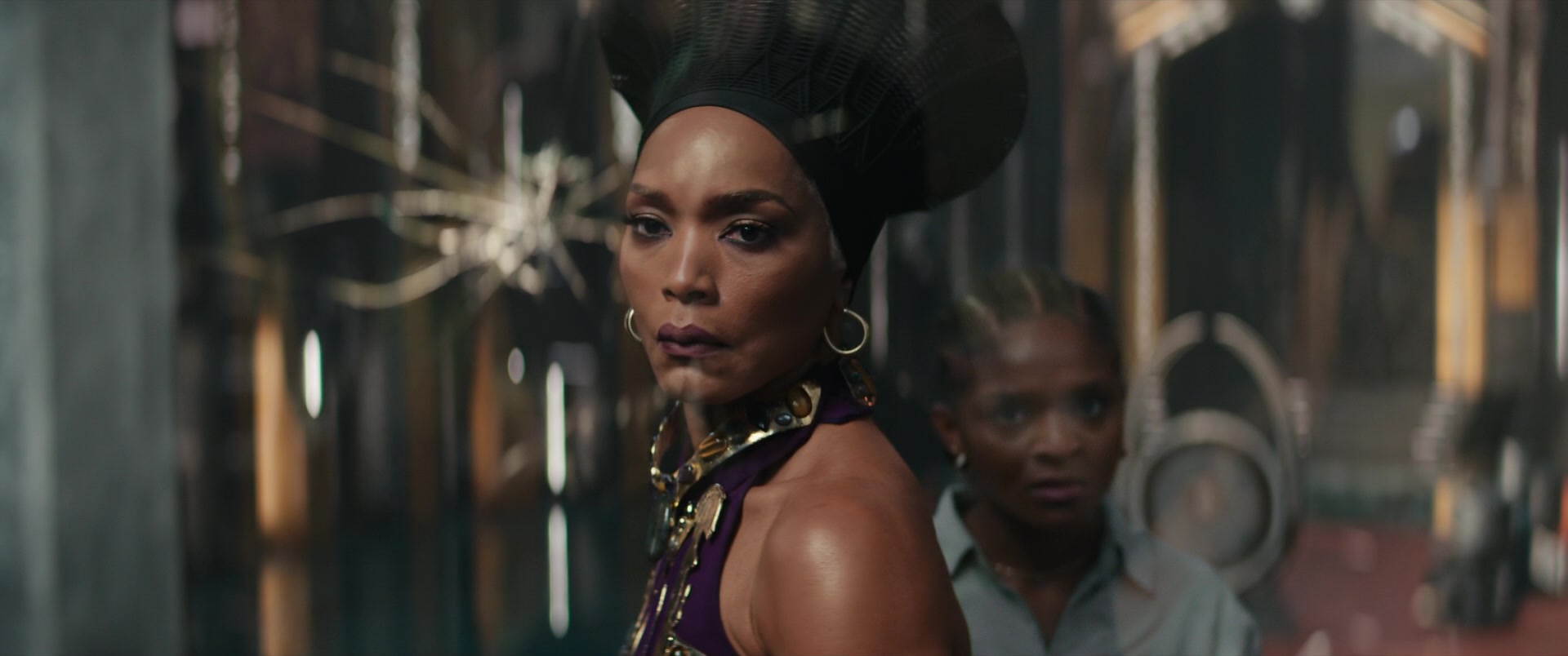 Queen Ramonda (Angela Bassett) stands firm against Namor's (Tenoch Huerta) in Black Panther: Wakanda Forever (2022), Marvel Entertainment