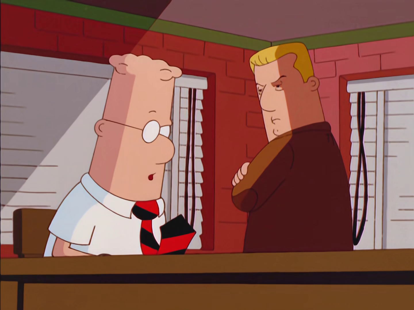 Dilbert (Daniel Stern) is interrogated by the police in Dilbert Season 2 Episode 12 "The Virtual Employee" (2000), UPN