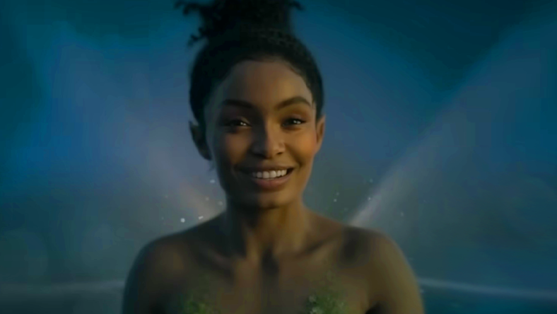 Tinkerbell (Yara Shahidi) watches on as the Darling children take flight in Peter Pan & Wendy (2023), Disney