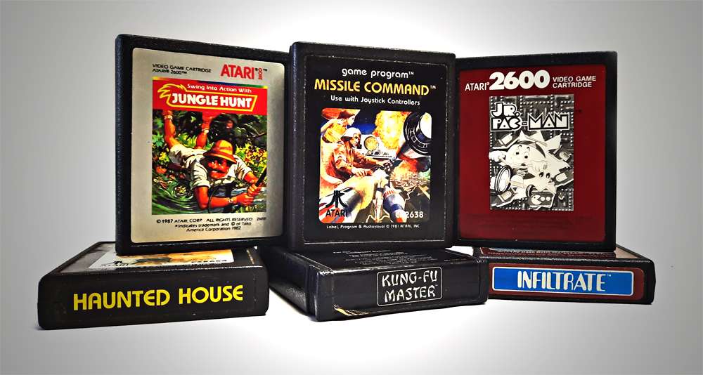 Collage of six video game cartridges playable on the Atari 2600 system.