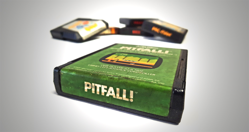 'Pitfall' and five other video game cartridges playable on the Atari 2600 system.