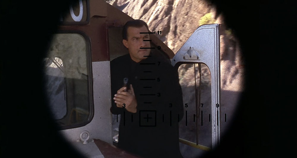 Casey Ryback in the crosshairs in 'Under Siege 2: Dark Territory' (1995), Warner Bros.
