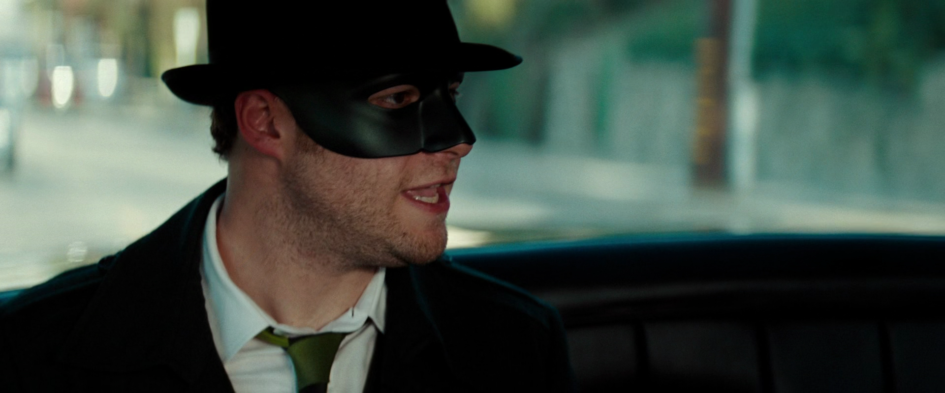 The Green Hornet (Seth Rogen) and Kato (Jay Chou) make their escape after blowing up Benjamin Chudnofsky's (Christoph Waltz) meth labs in The Green Hornet (2011), Sony Pictures