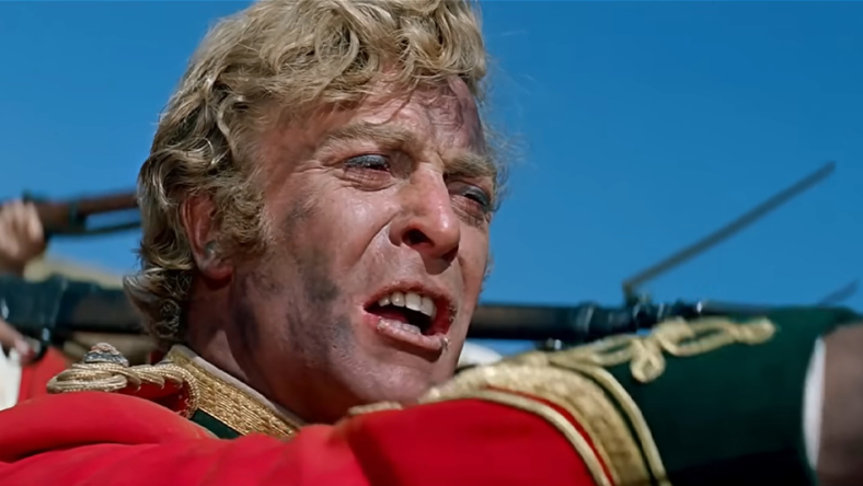 Lt. Gonville Bromhead (Michael Caine) orders his troops to fire in Zulu (1964), Diamond Films